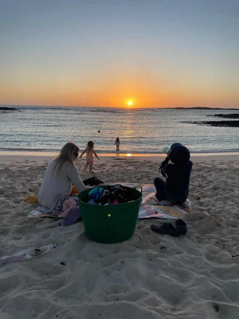 Sabrina at the beach with her children